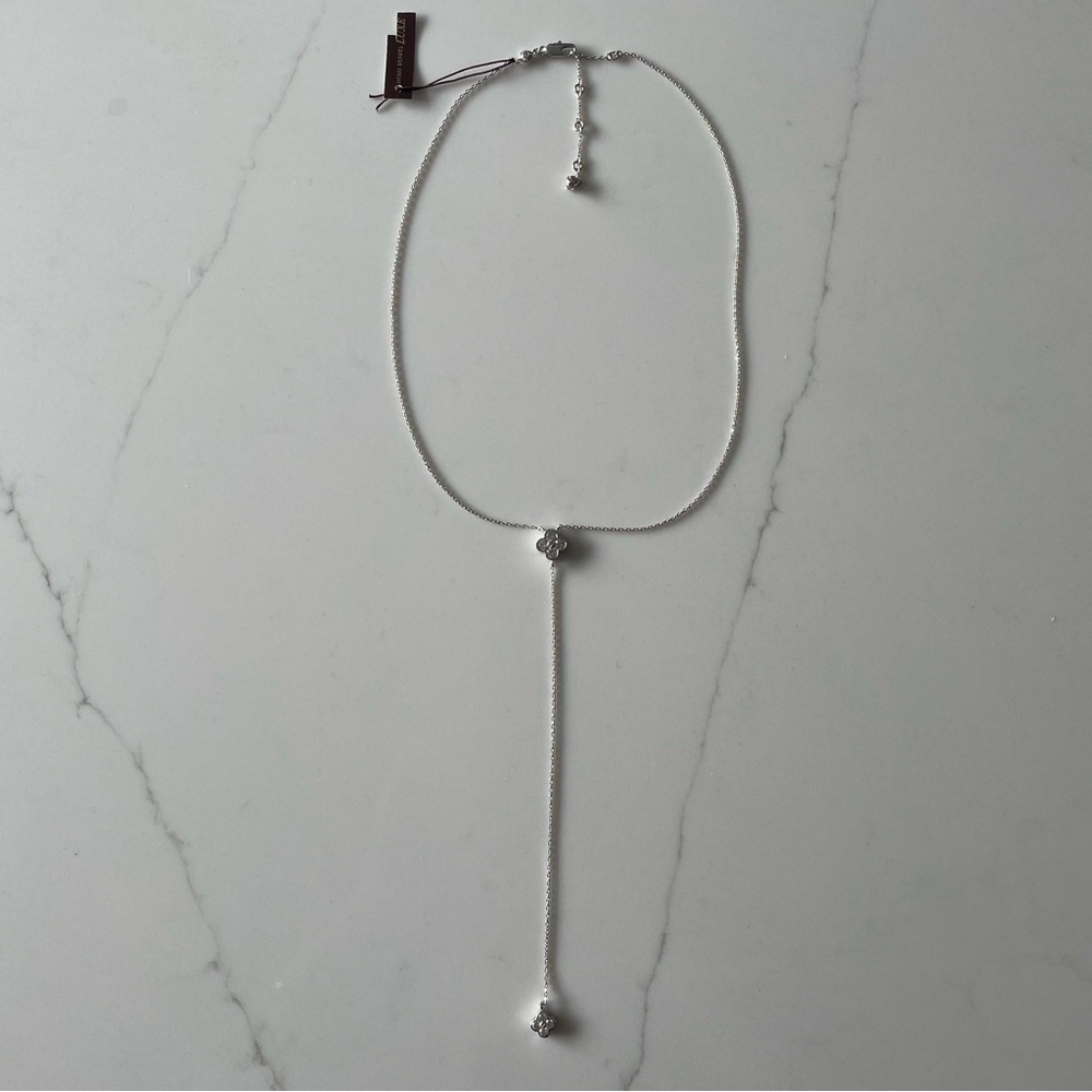 Henri Bendel silver lariat necklace.